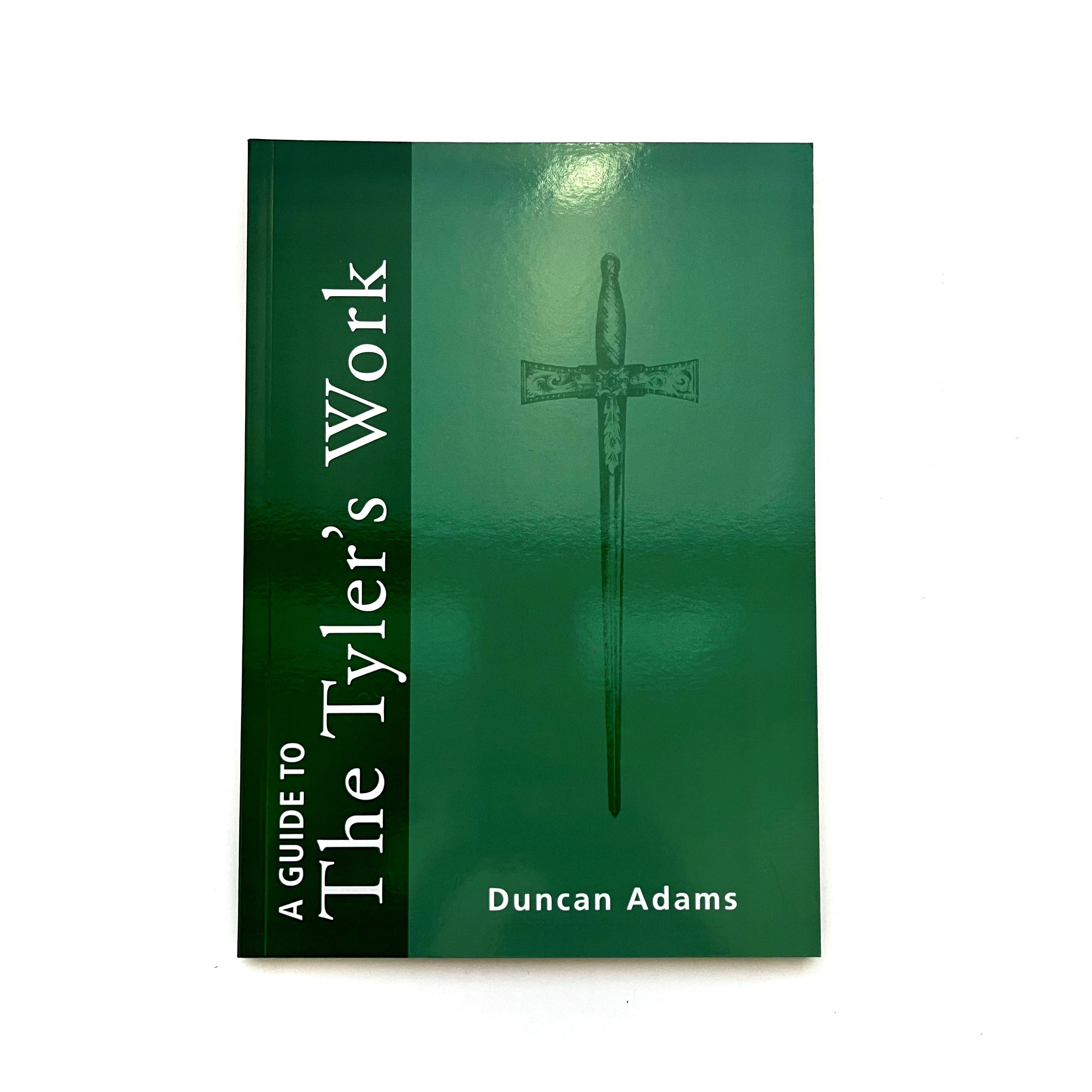 A green Masonic book titled 'A Guide To The Tyler's Work' by Duncan Adams.