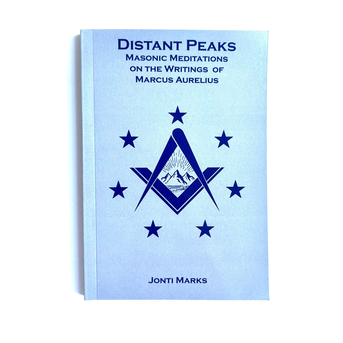 A book titled 'Distant Peaks' with a blue cover featuring stars and a Masonic symbol.