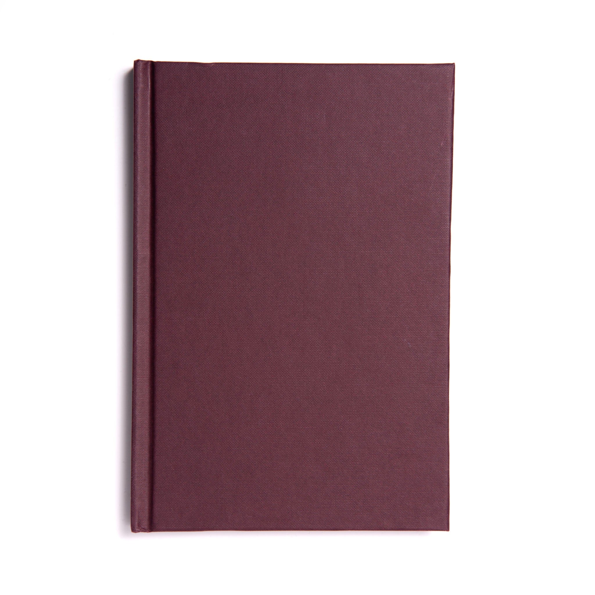 A closed book with a plain maroon cover, titled 'Domatic Royal Arch Ritual', placed against a white background.