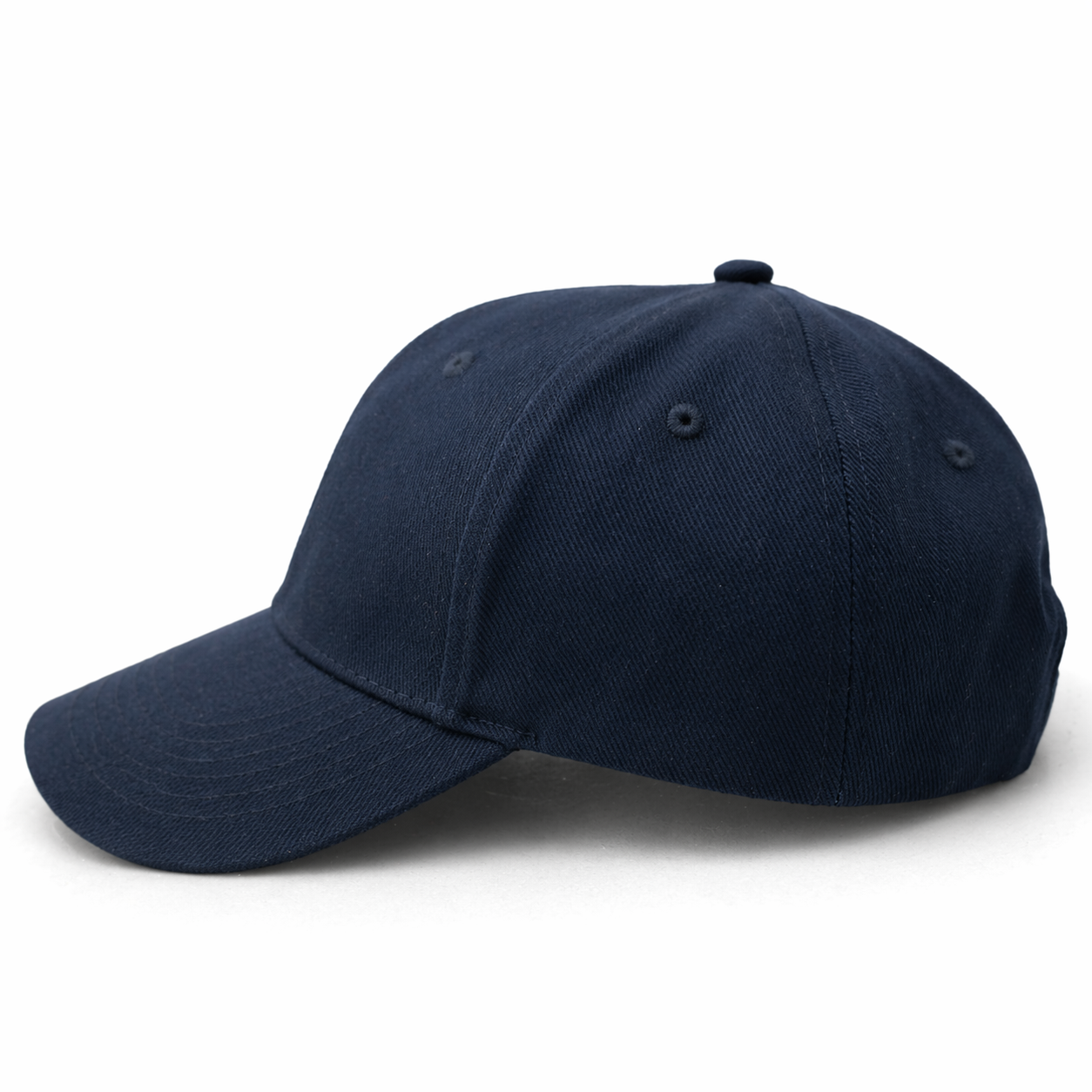 Side view of navy blue baseball cap with a curved brim