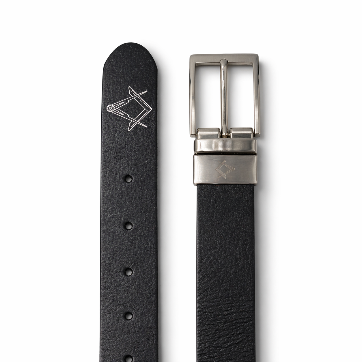 Black leather belt with silver buckle on a white background, showing the Masonic square and compasses engraved on the buckle and embossed on the belt tip.