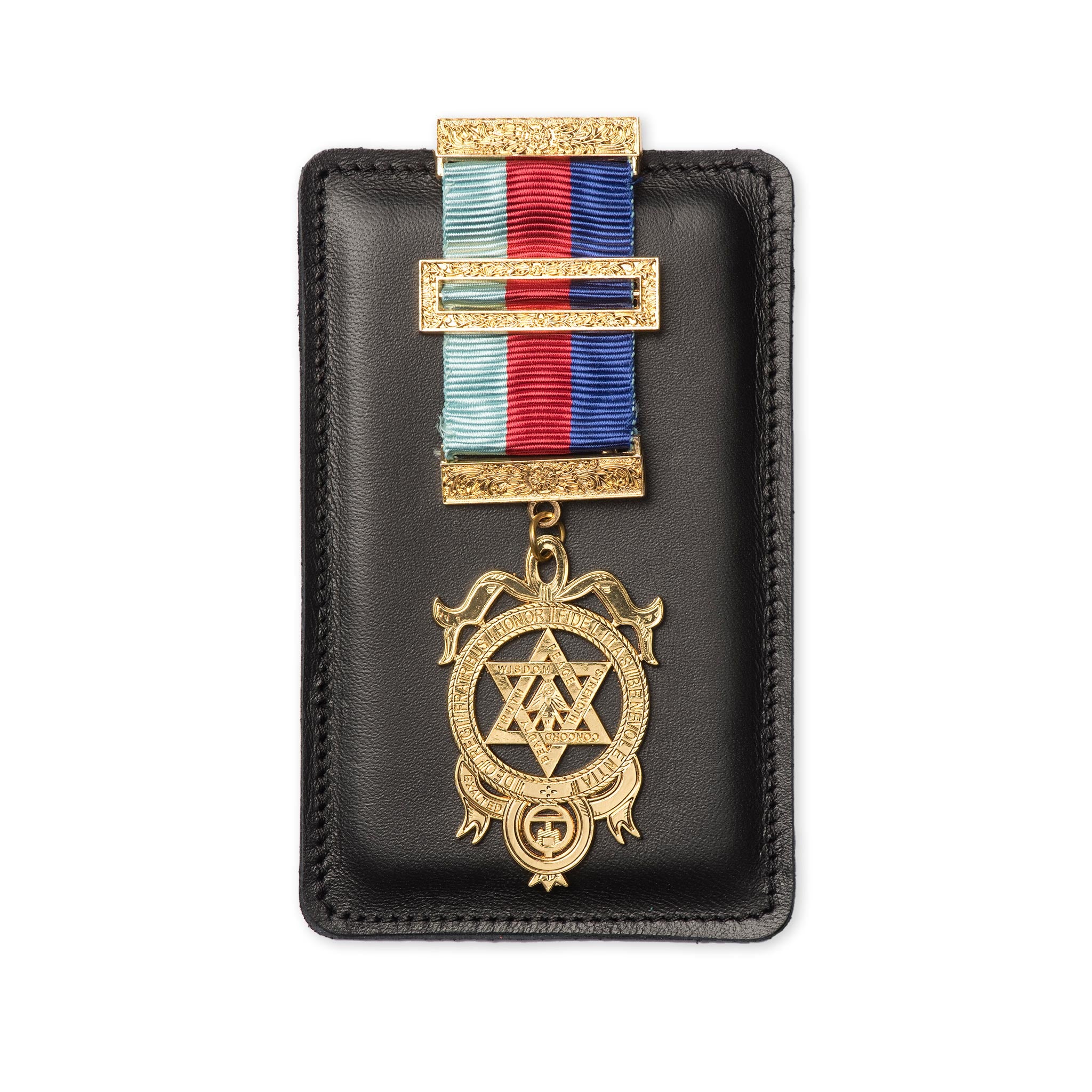 A Masonic black leather jewel pad with golden coloued jewel and a striped red and blue ribbon.