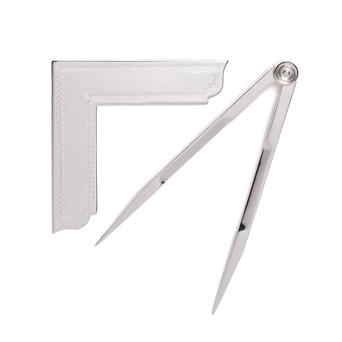 A set of silver-plated Masonic working tools including a square and compasses, presented on a white background.