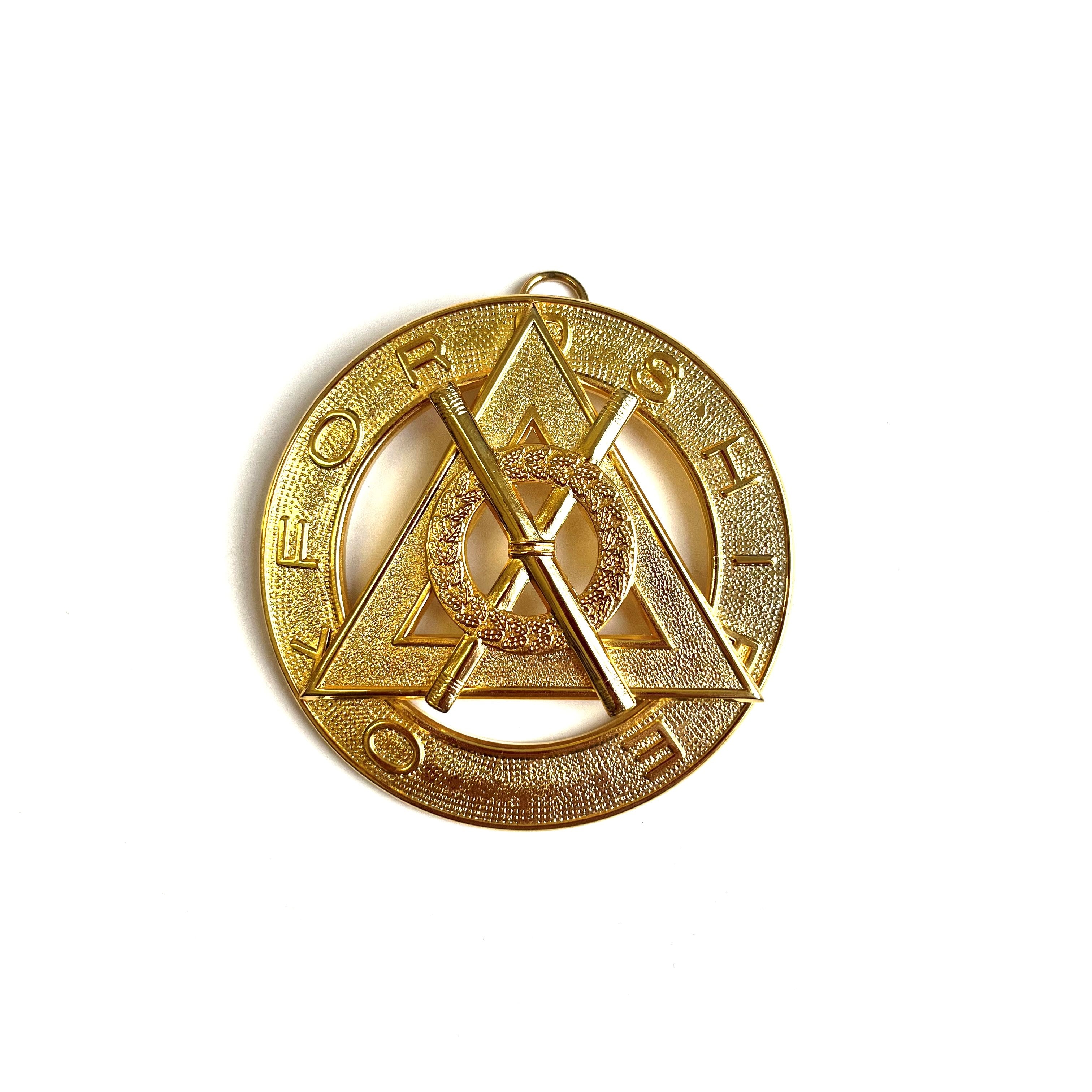 A Masonic Royal Arch Active District Collar Jewel gold-colored metal collar jewel.