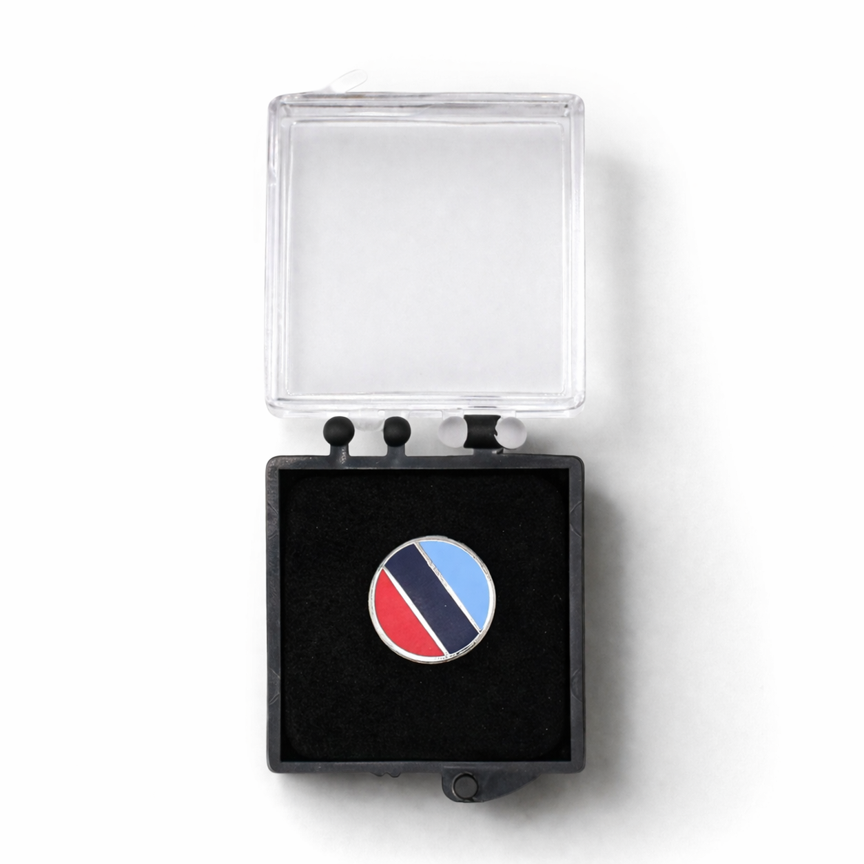 Front view of one journey silver-tone round Masonic lapel featuring in light blue, dark blue, and red inside case