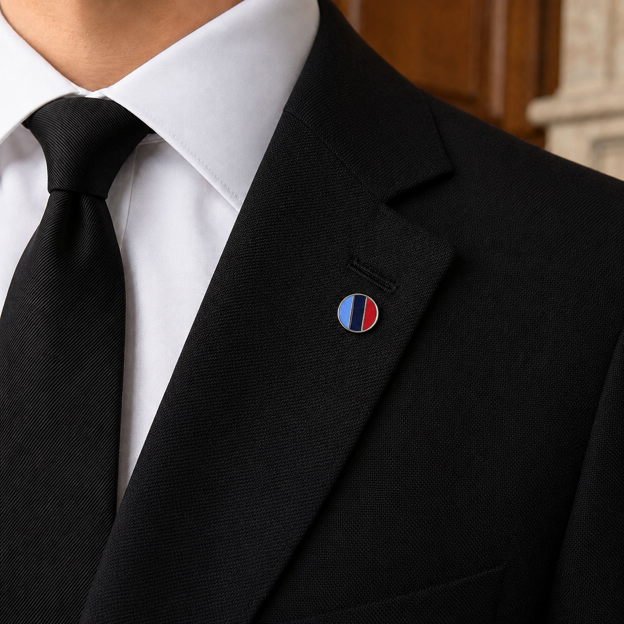One journey silver-tone round Masonic lapel pin badge featuring in light blue, dark blue, and red.