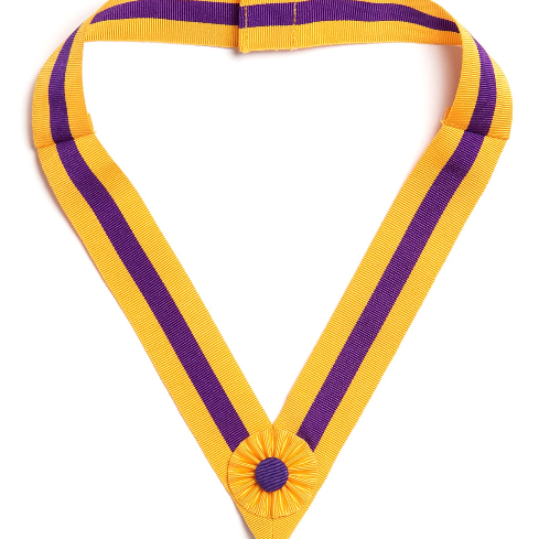 Yellow and purple ribbon Masonic collarette with a decorative element on a white background