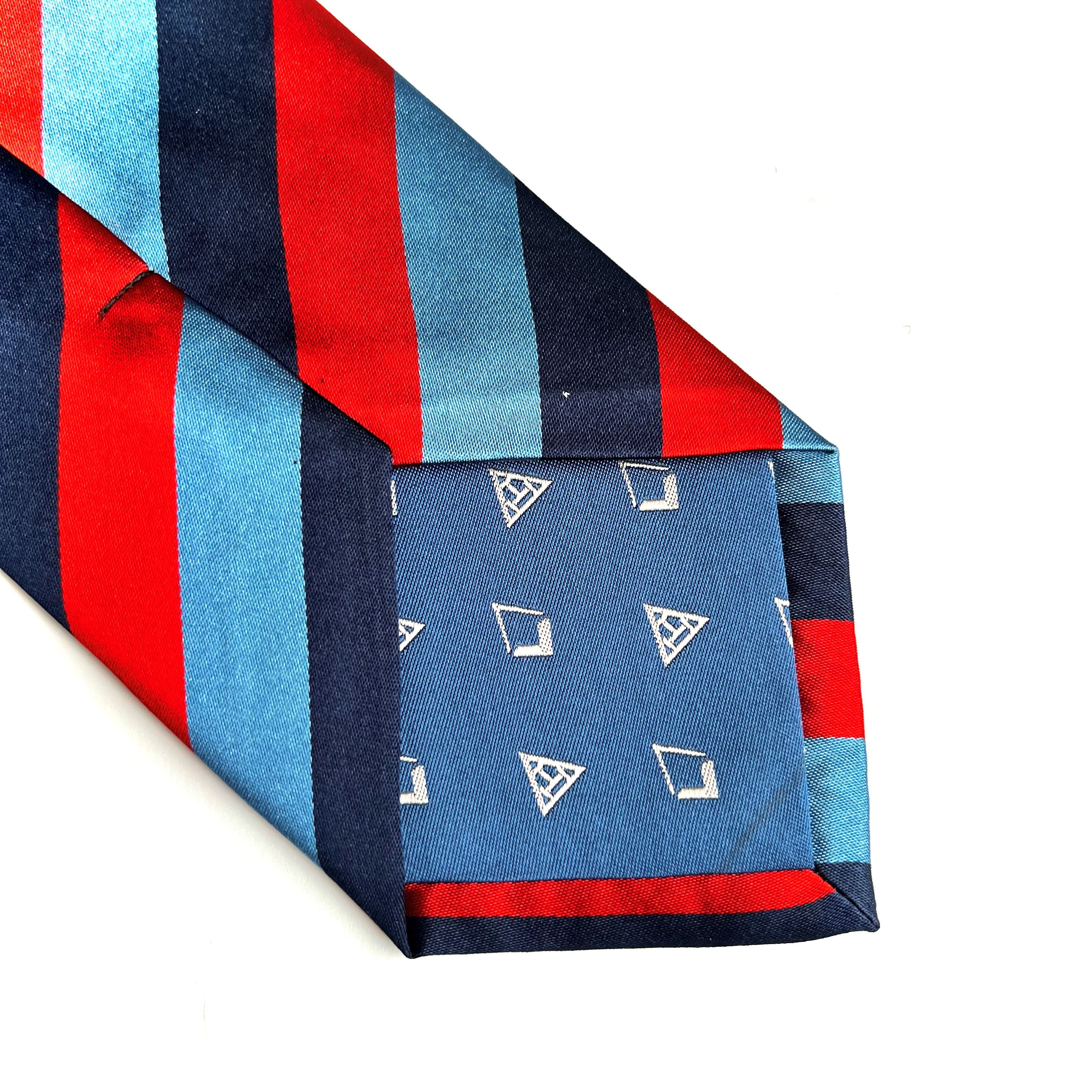 Striped One Journey Tie UGLE back showing tipping with square & compasses and Royal Arch logos, in light blue, navy and red stripes on a white background