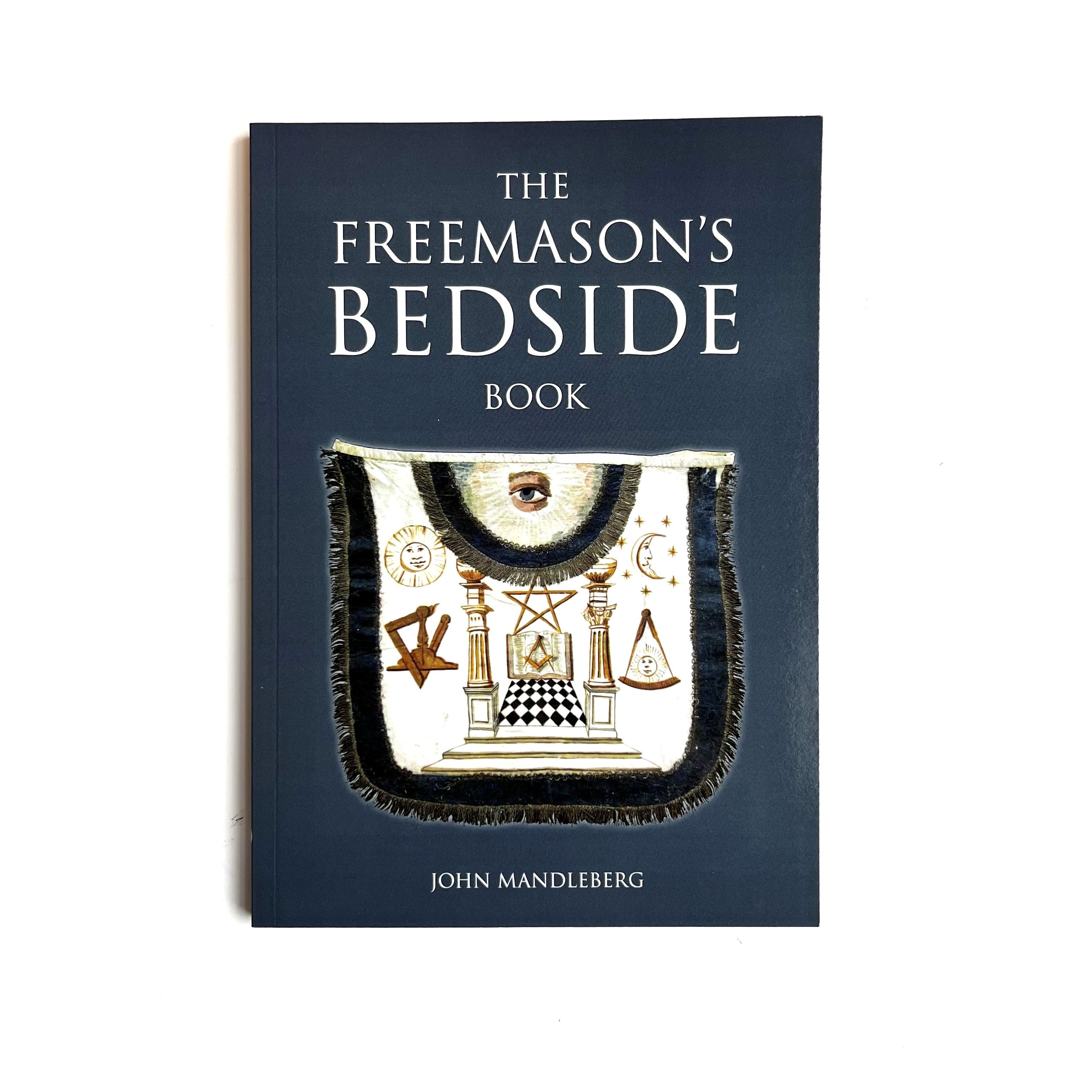 The cover of 'The Freemason's Bedside Book' by John Mandleberg features a stylized design with Masonic symbols and architectural imagery against a dark background.