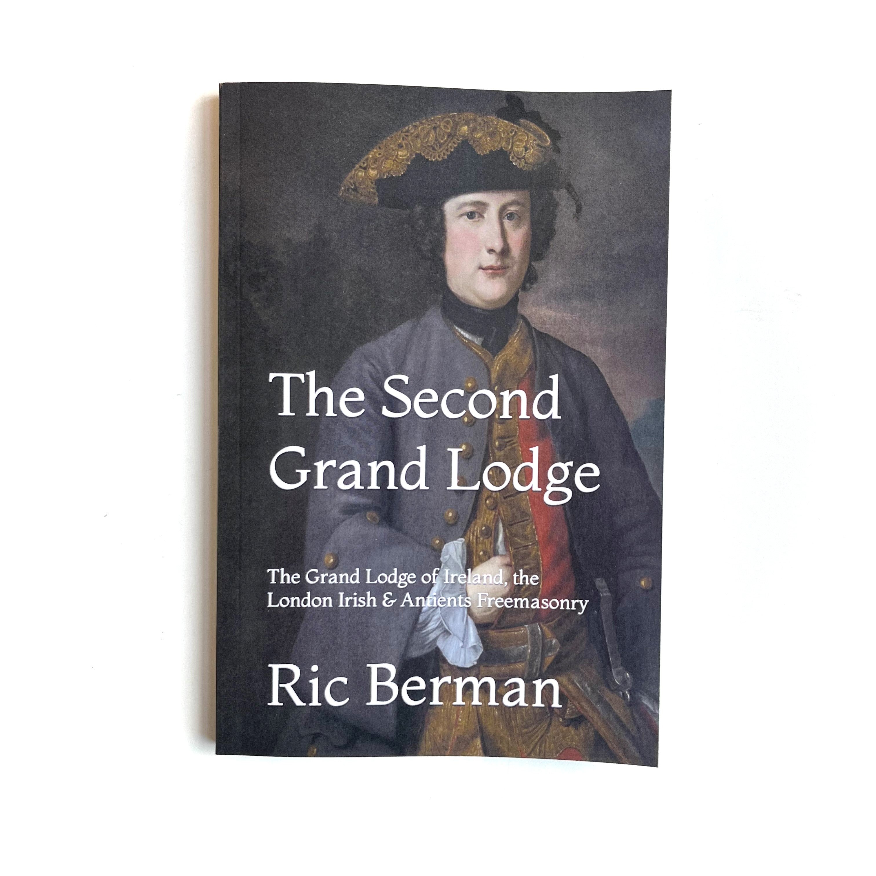 This image features the cover of a book titled "The Second Grand Lodge" by Ric Berman. The cover displays a portrait of a man wearing a black and gold military-style uniform, with a prominent red wig and a blue and gold sash.