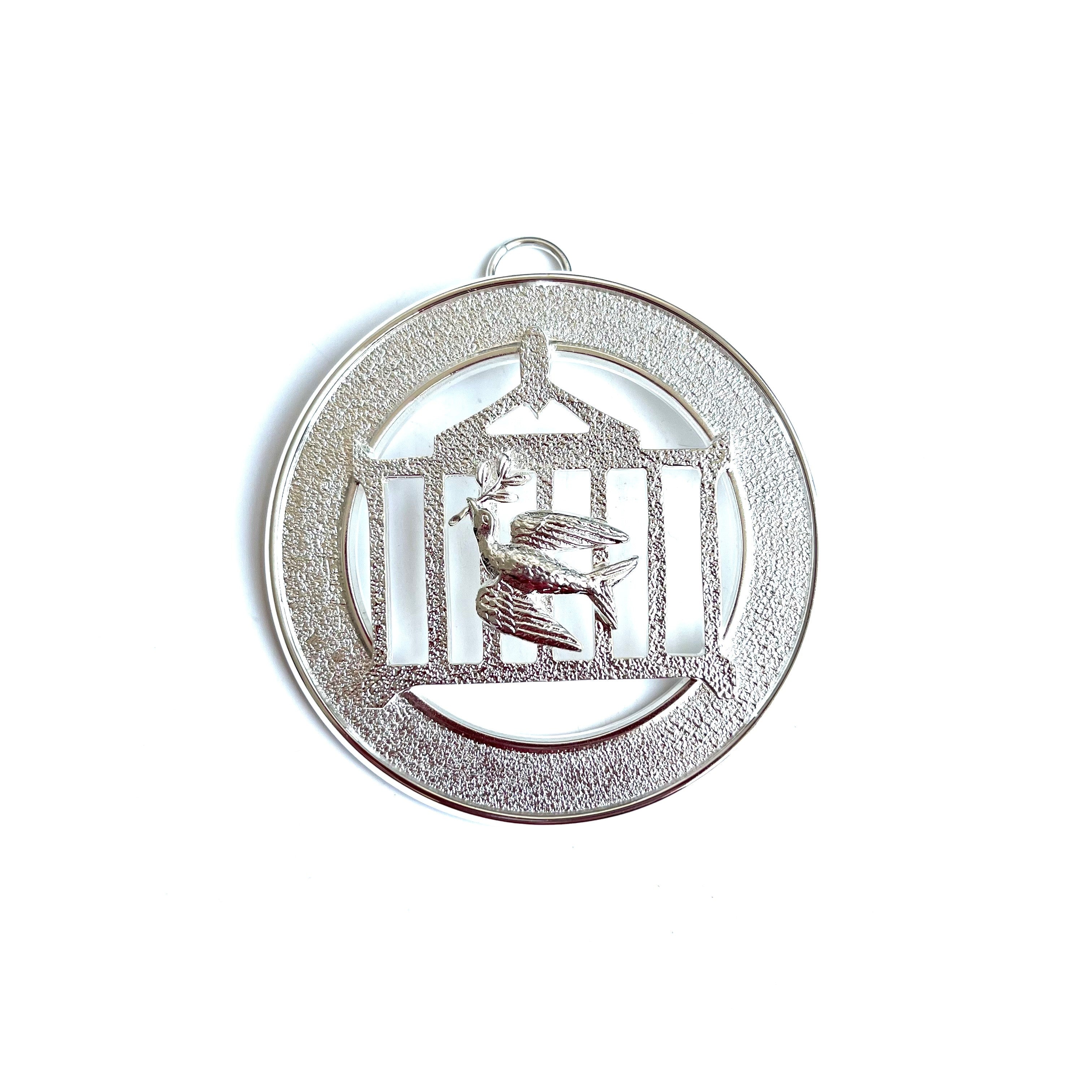 Allied Officer's Collar Jewel - Senior and Junir Deacon, silver colouted, on a white background.