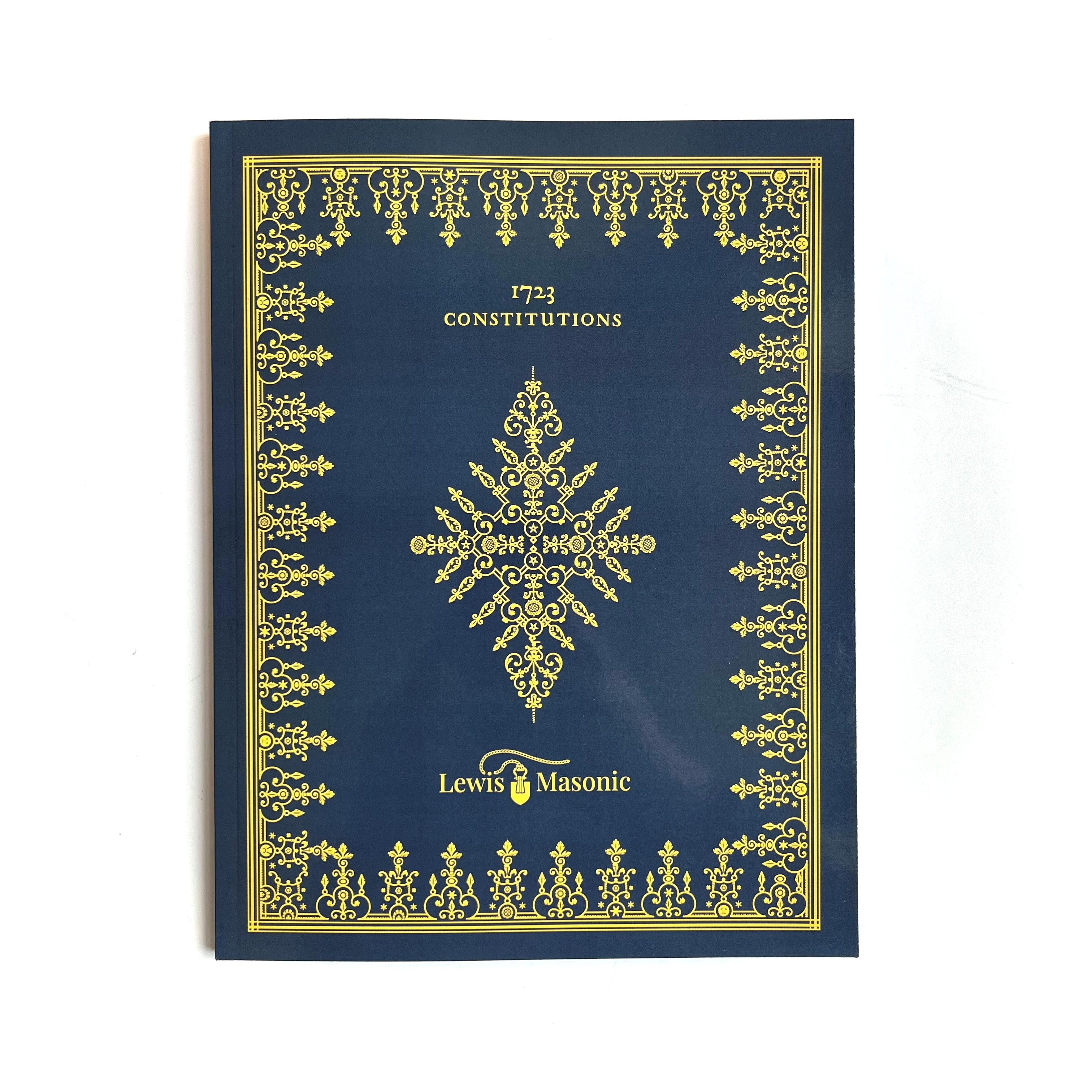 A book cover of 'Anderson's 1723 Constitutions' featuring a blue background with ornate gold filigree design and text.