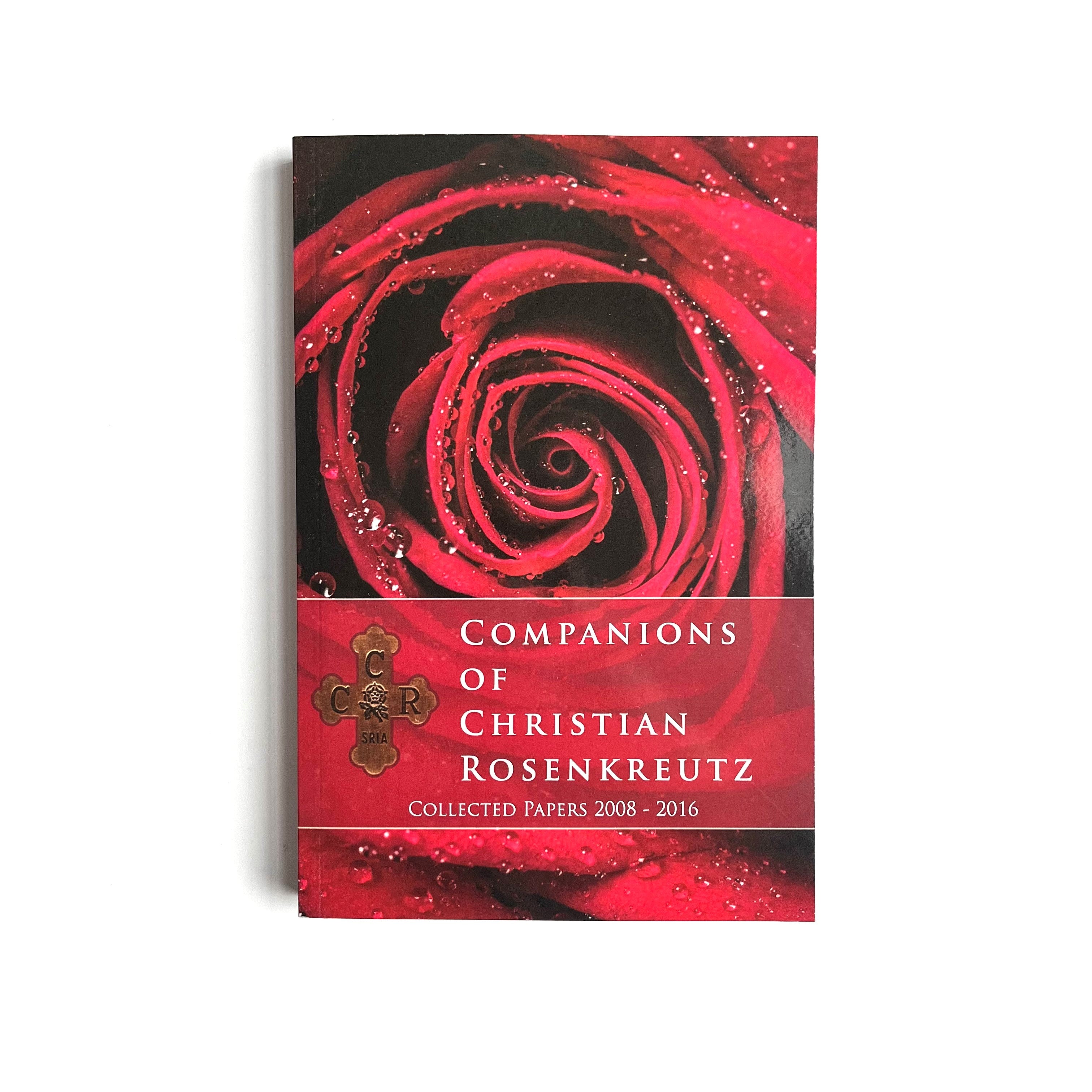 A book cover with a red rose design and the title 'Companions of Christian Rosenkreutz - Collected Papers 2008-2016'.