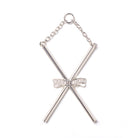 A silver-colored collar jewel with a V-shaped design and a central ornamental element, suspended from a small chain.