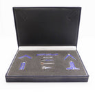 A vbox containing a Masonic tool set with blue enamel accents, displayed on a grey background.