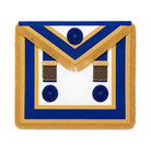 Craft provincial dress rosettes apron with blue trim and gold fringe.