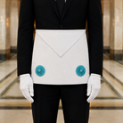 UGLE approved Fellow Craft Masonic apron with turquoise rosettes worn with black suit and white gloves.