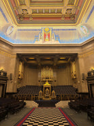 A photograph shwoing part of the inside of Freemasons' Hall Grand Temple in London.