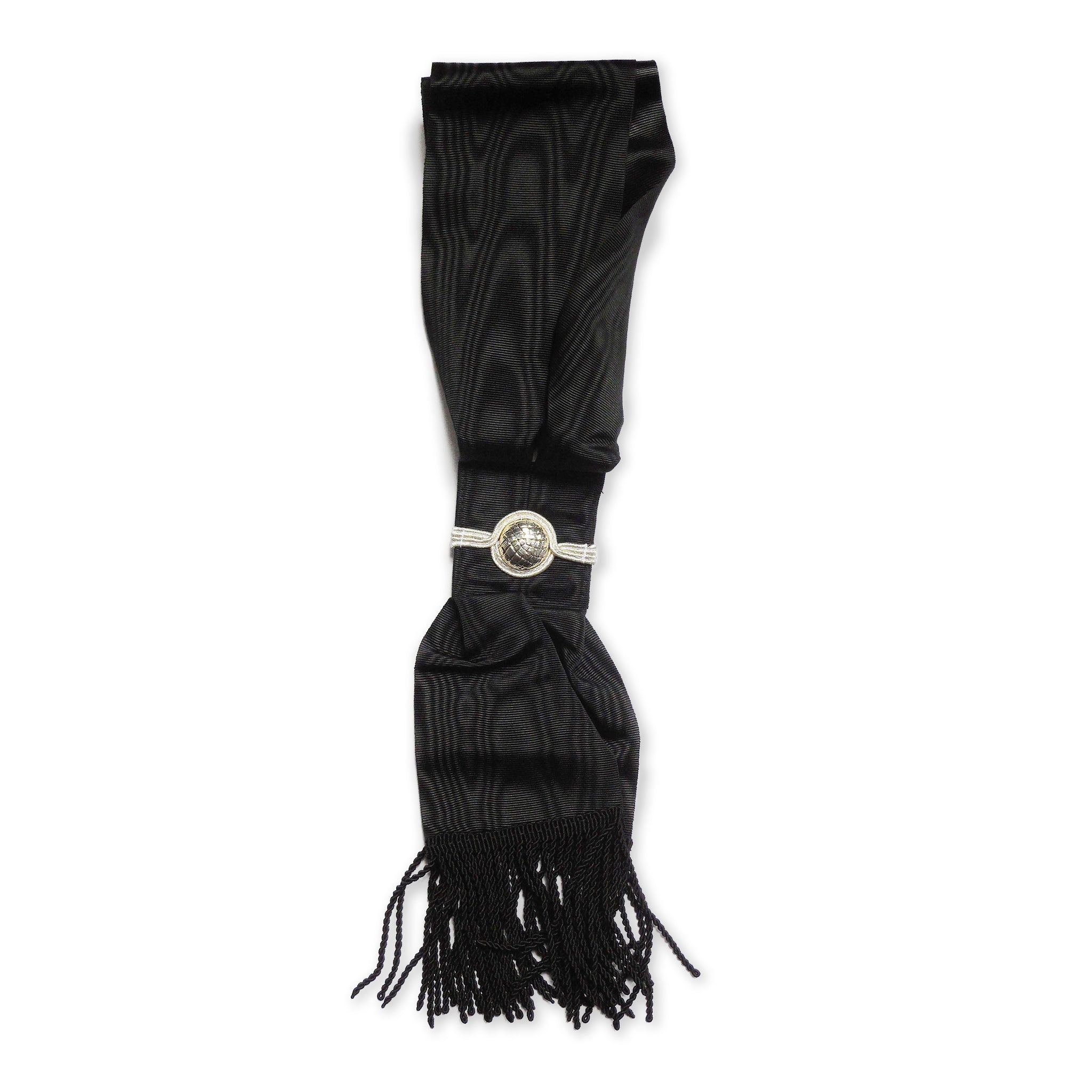 A Masonic black sash withsilver braiding and a tassel, likely made of silk or satin.