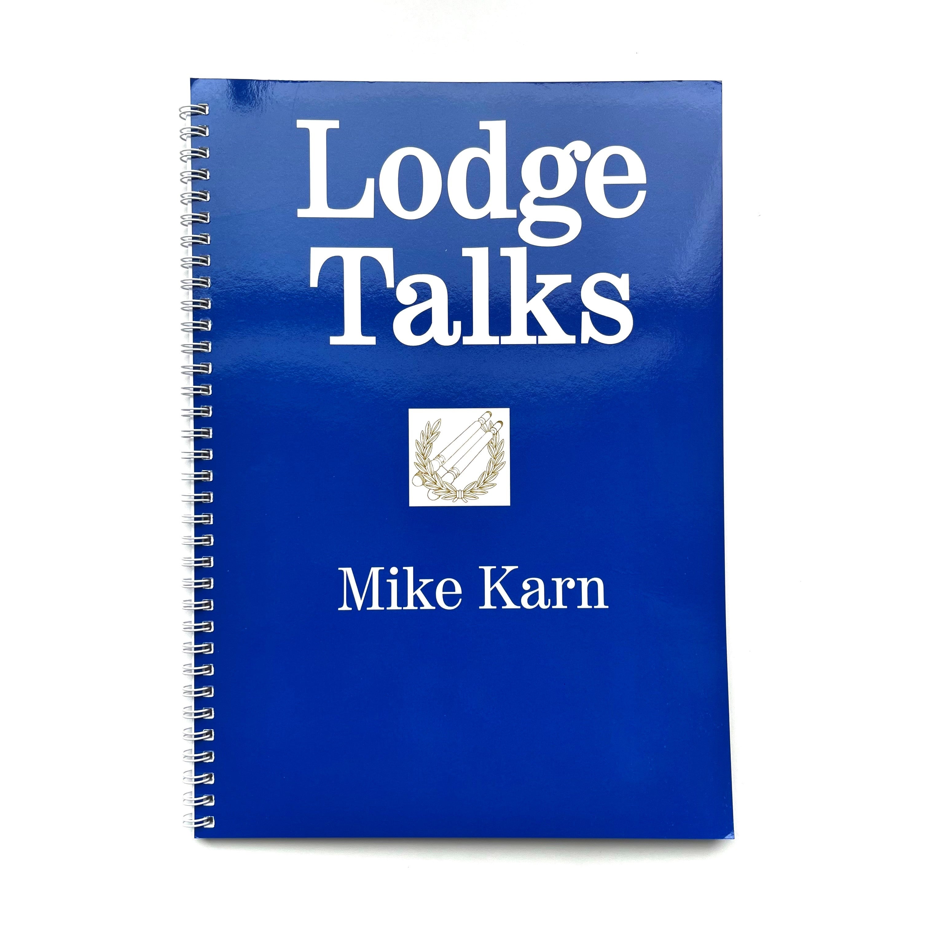 A blue book with a title 'Lodge Talks' by Mike Karn on the cover.