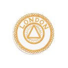 A gold-colored Masonic apron badge featuring the word 'LONDON' along with a Masonic emblem, encircled by a decorative border.