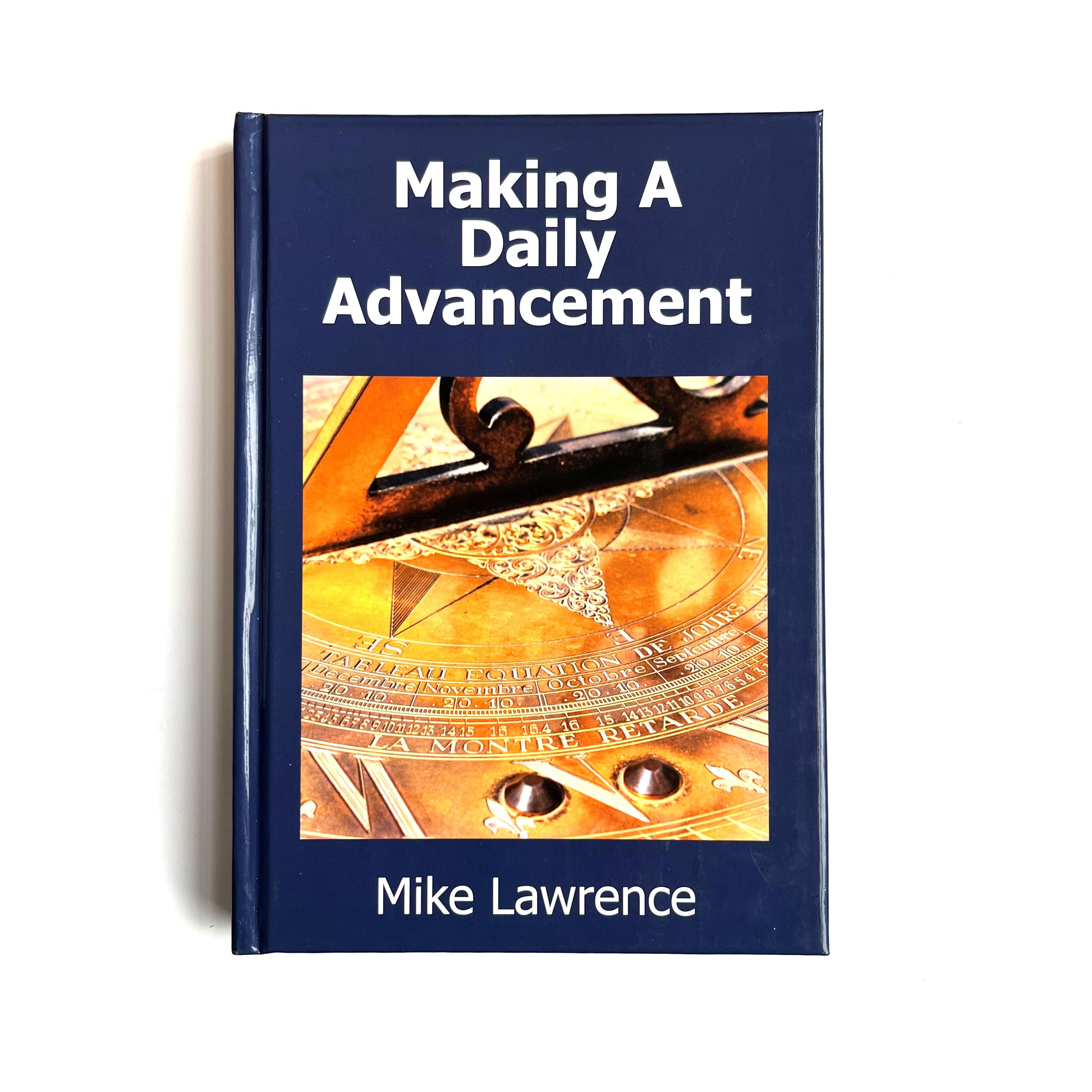 A book cover with a title 'Making A Daily Advancement' by Mike Lawrence, featuring a compass design.