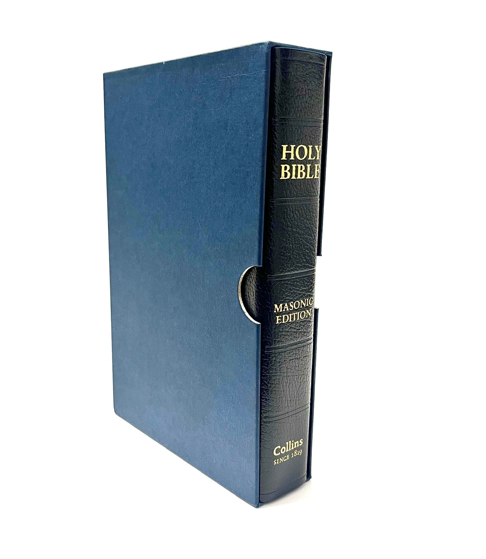 Masonic Bible book in outer Box with gold text on a black background