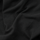 Close up image of black masonic polo shirt fabric.