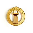 A gold-coloured metal collar jewel with the inscription 'MIDDLESEX' and a Masonic symbol in the center.