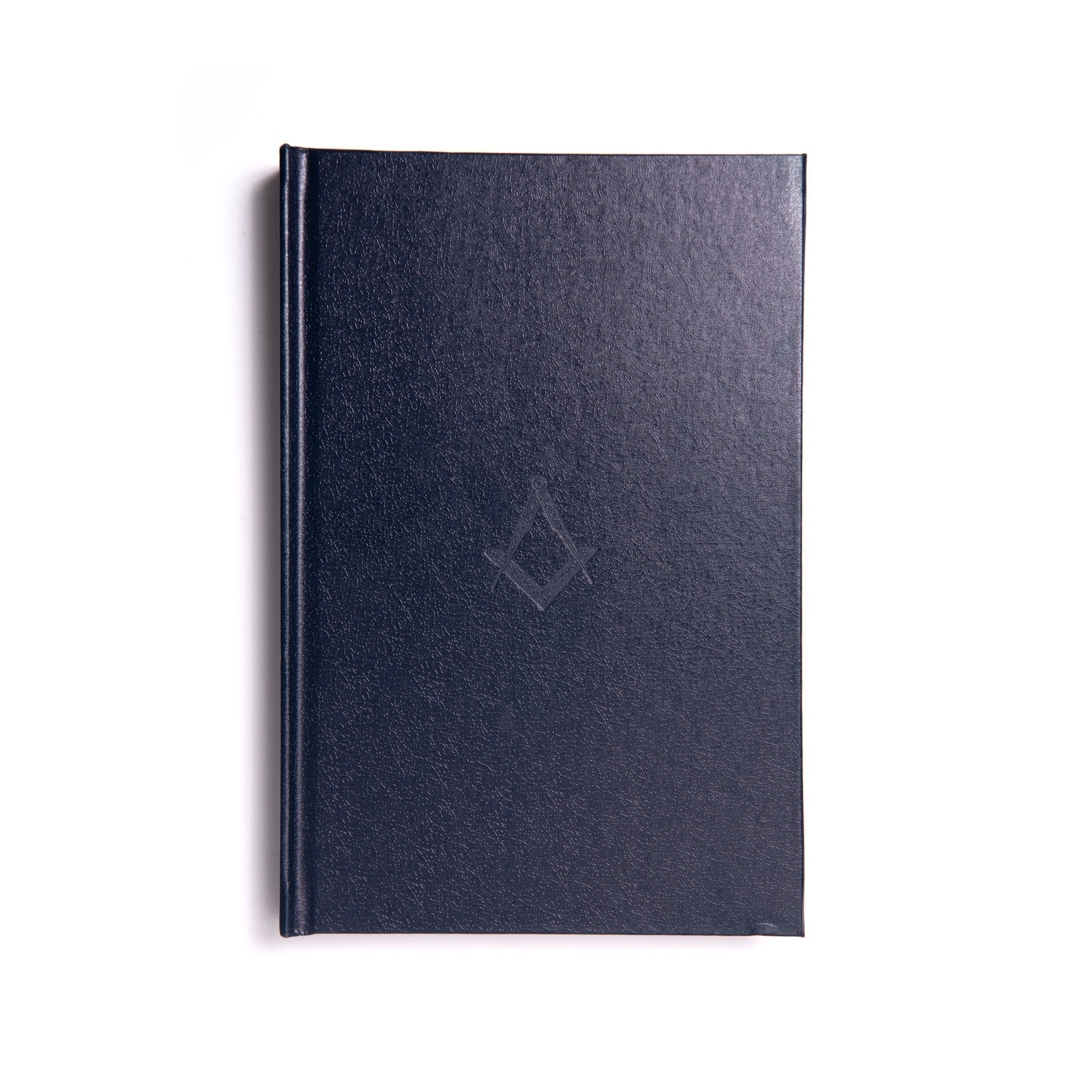 A Masonic Emulation Large Print Ritual closed book with a navy blue cover, displaying a Masonic symbol in the center.