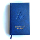 Blue ritual book with Masonic emblem and 'Bi-Centenary Edition' text on a white background