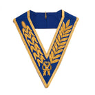 A blue and gold Masonic Craft Grand Rank Dress Collar with embroidered designs in gold on a blue background.
