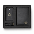 Black leather gift set in a presentation box, including a passport holder,  travel wallet and a luggage tag, each featuring a gold Masonic square-and-compass emblem.