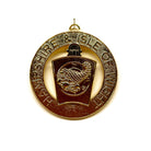 Gold coloured metal medal with a central emblem and 'Hampshire & Isle of Wight' text on a white background