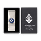 Metallic money clip with a Masonic blue square and compasses symbol inside Freemasons' Hall presentation box