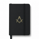 Black pocket size A6 black notebook embossed with Square &amp; Compasses symbol and lined pages inside.
