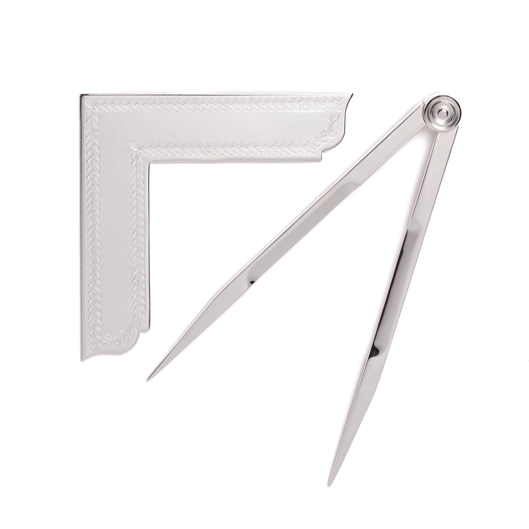 A set of silver-plated Masonic working tools including a square and compasses, presented on a white background.