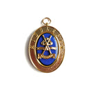 A gold and blue-coloured metal collar jewel with a blue enamel background and a Masonic symbol.