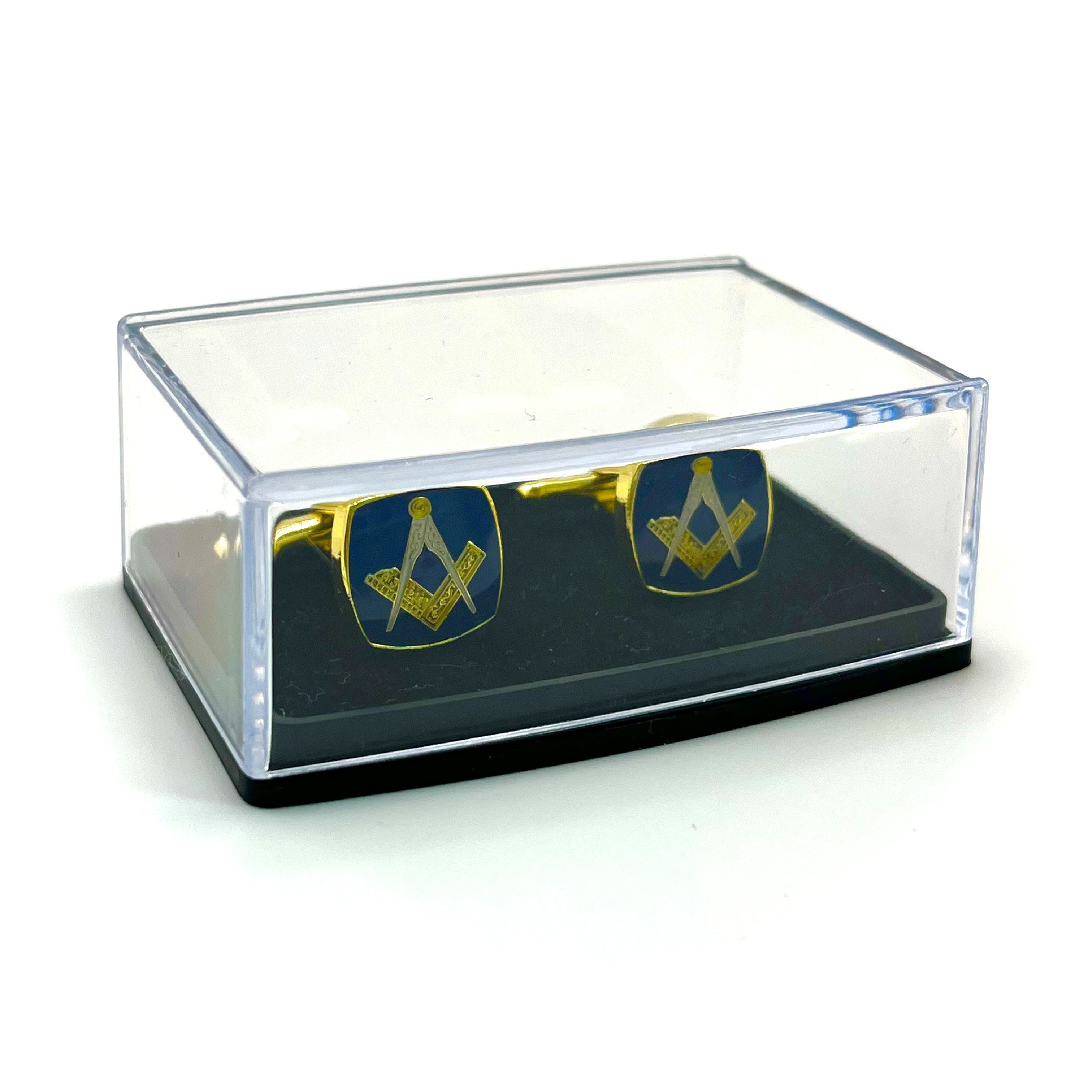 Masonic cufflinks in a clear gift box on a white background