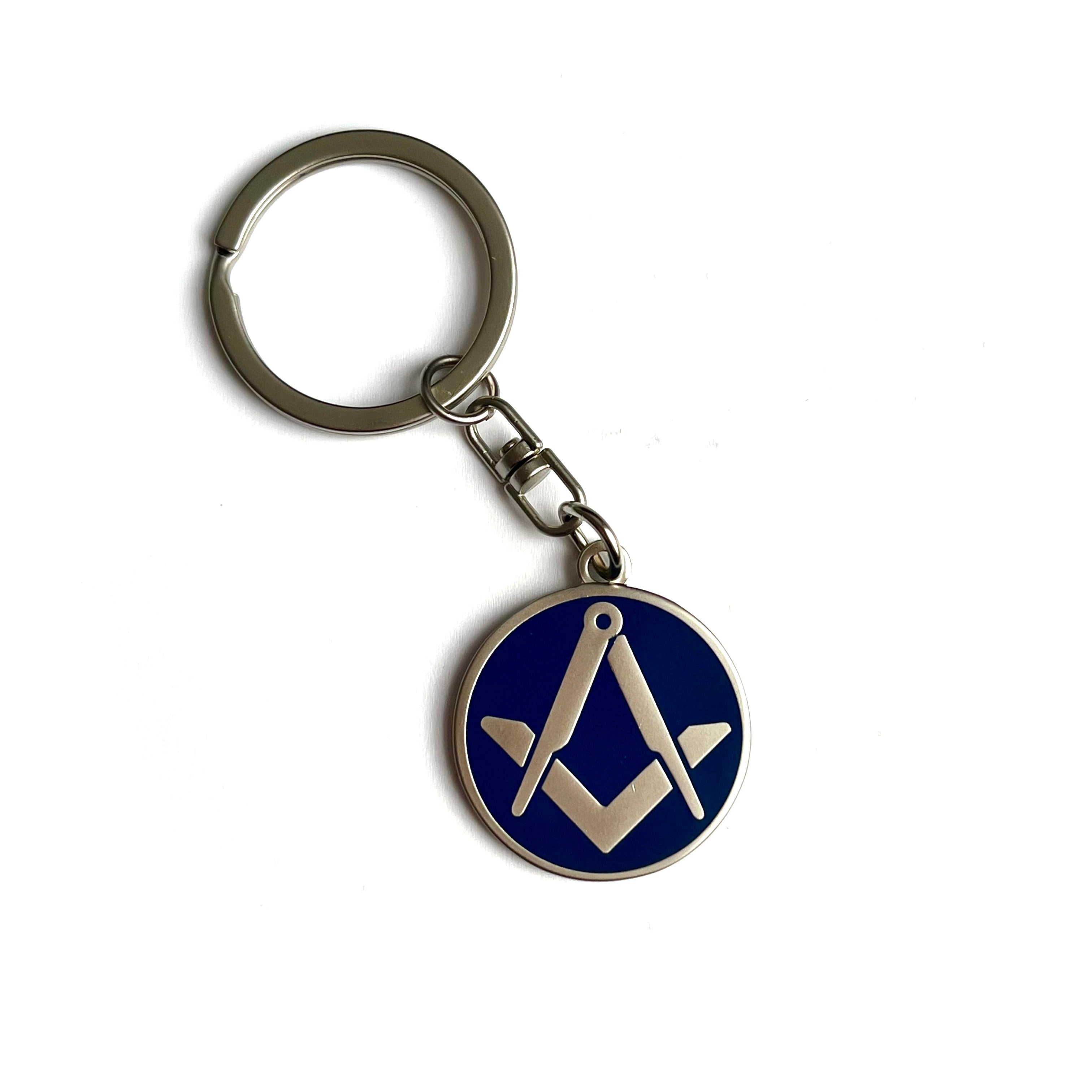Blue & matt silver Keyring with Masonic symbol on a white background