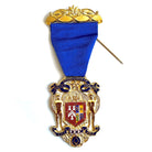 Gold medal with blue ribbon and emblem on a white background