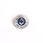 A round blue and silver colored lapel pin with the text 'CELEBRATING 300 YEARS' and the years '1717-2017' on it.