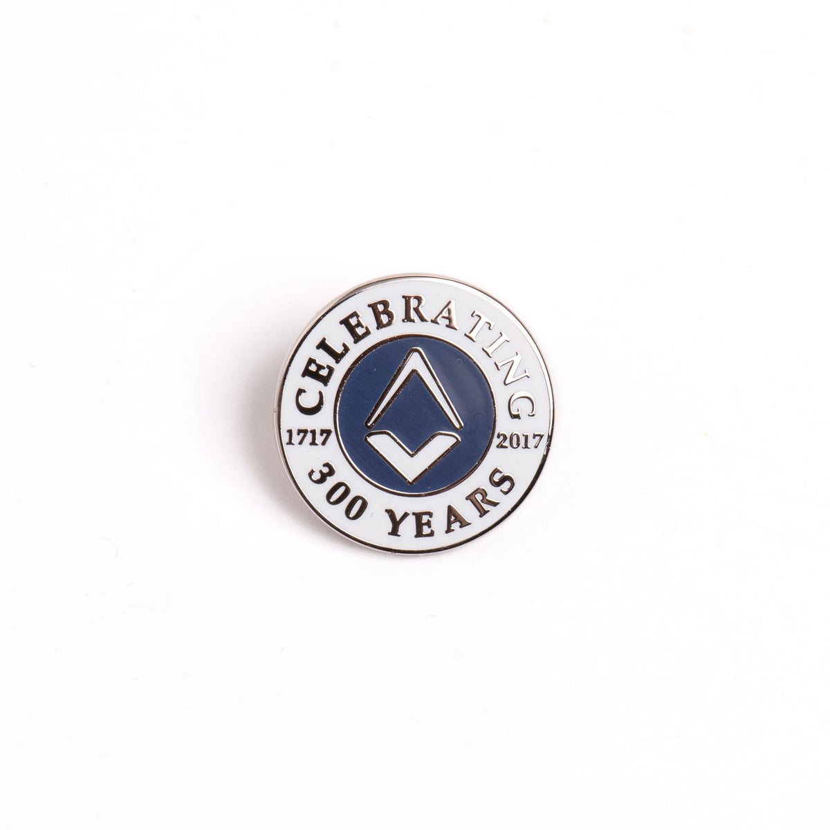 A round blue and silver colored lapel pin with the text 'CELEBRATING 300 YEARS' and the years '1717-2017' on it.