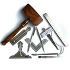 Full Sst of metal and wooden Masonic tools  on a white background