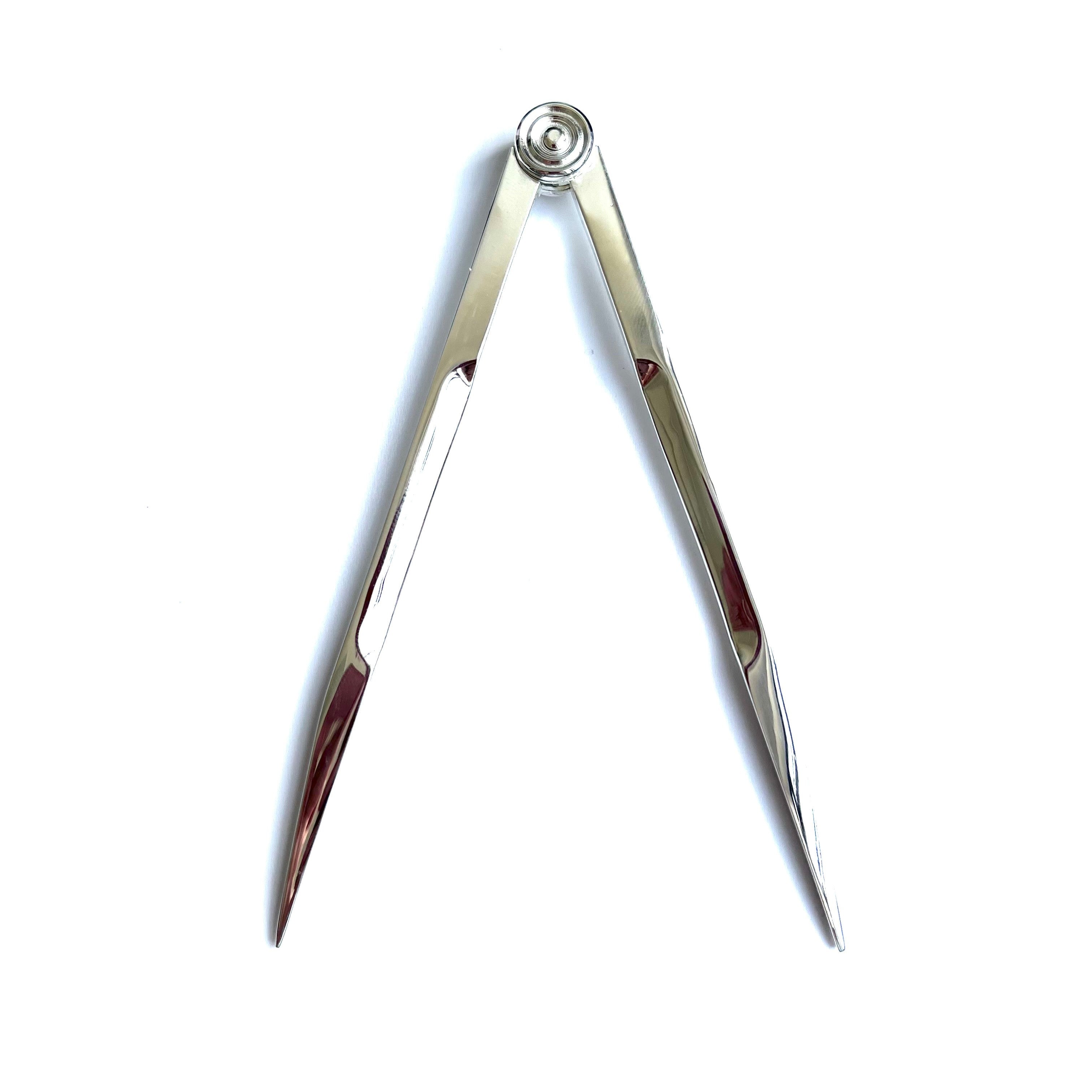 Metal compass on a white background