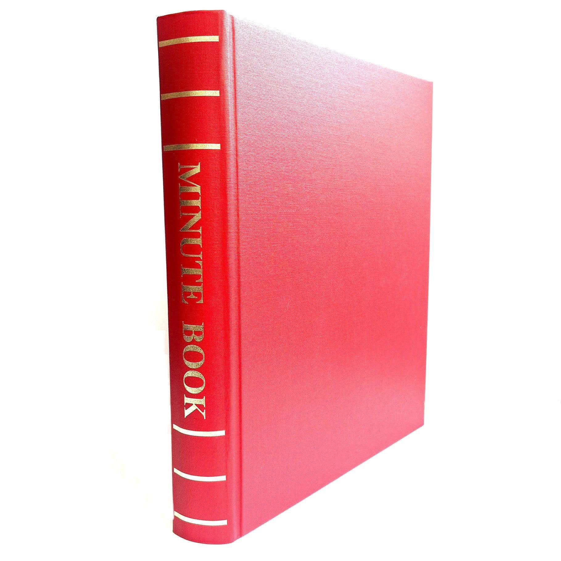 A bound minute book with a red cover, the title 'MINUTE BOOK' is visible on the spine.