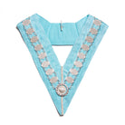A blue Masonic chain collar with metallic embellishments and a central emblem.