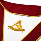 Past Thrice Illustrious Masters Masonic apron with burgundy trim and gold embroidered emblem close up view