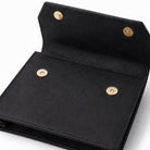 Open black leather Masonic jewel holder with double magnetic button fastenings