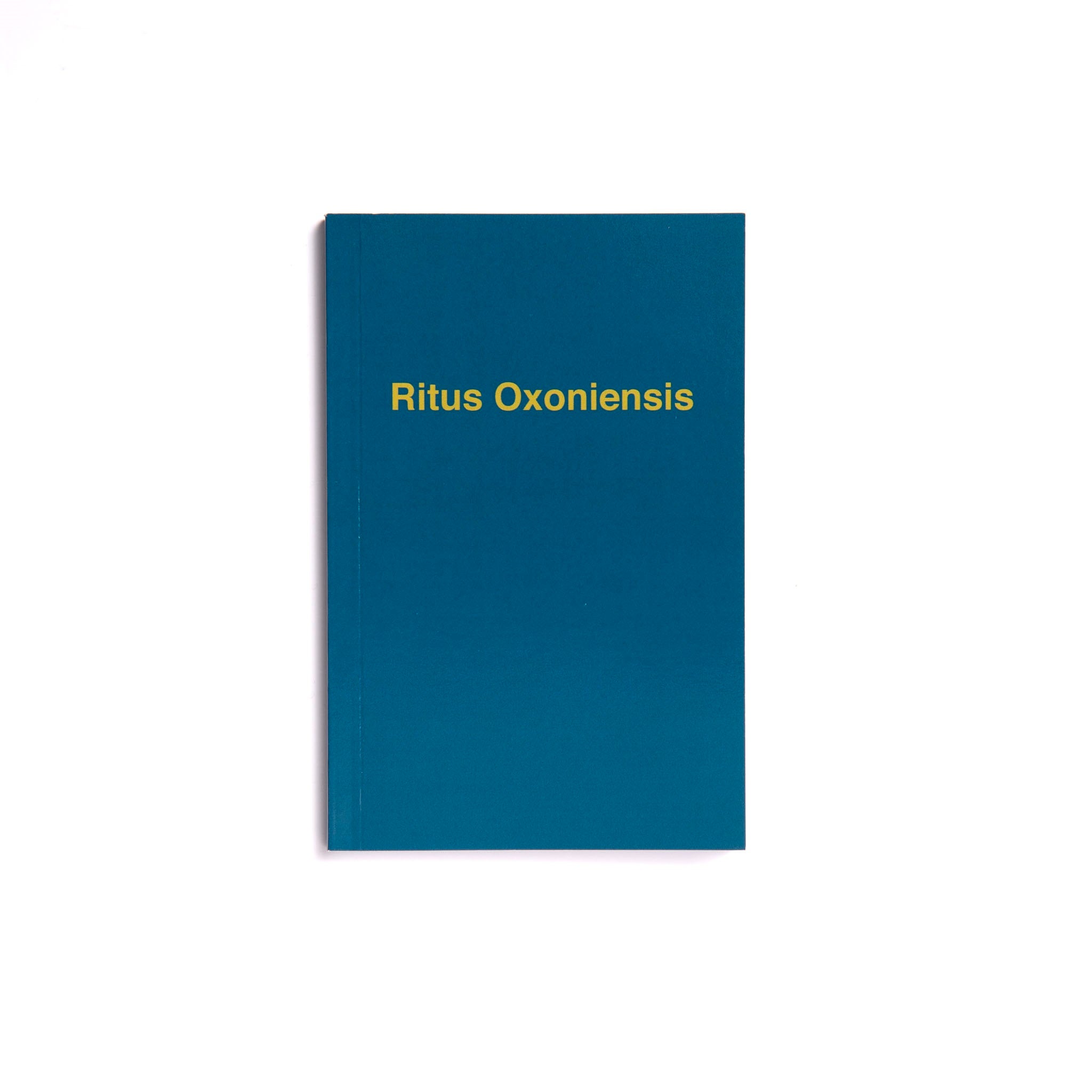 A blue Masonic Ritual book with gold lettering 'Ritus Oxoniensis'